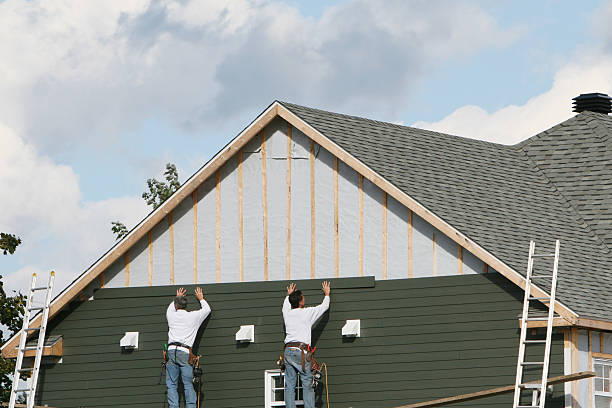 Professional Siding technician working in Alexis, NC
